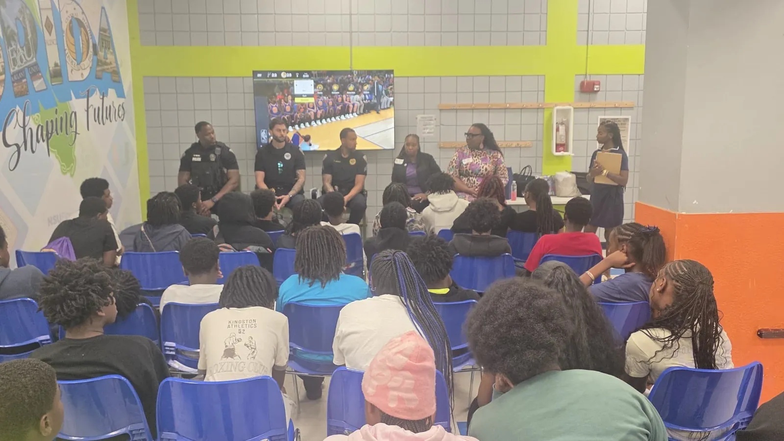 Police officers and community representatives on the panel, speaking to youth at the Lauderhill Boys & Girls Club