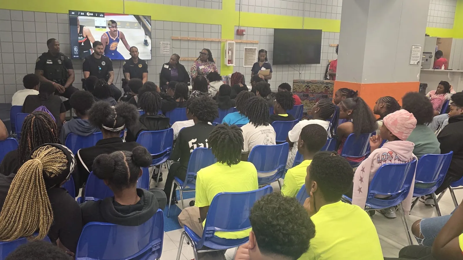 Youth listening to the panel discussion during the Teen Takeovers workshop